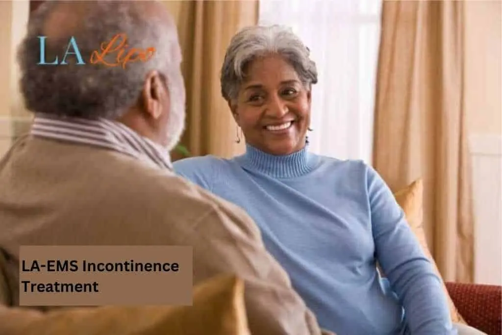 Couple sat smiling at each other - LA-EMS treatment Waltham Forest