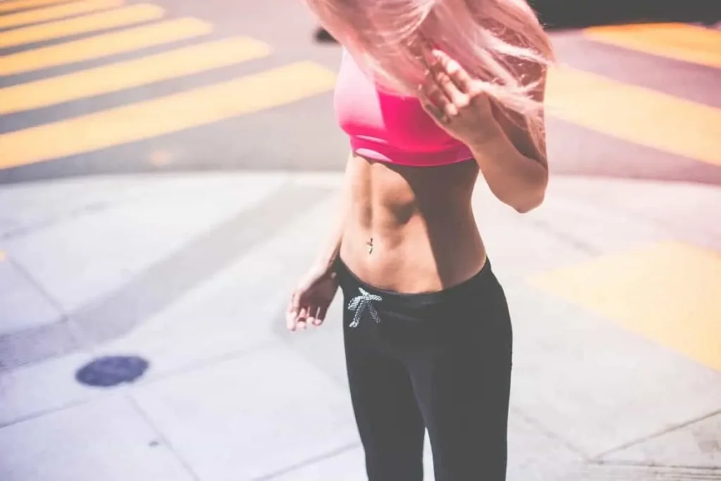 Woman with toned stomach after LA-EMS Body Sculpting Treatment Waltham Forest